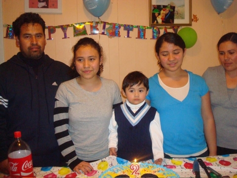 Vivian, second from right, with (left to right) her dad, brother, younger sister and mother.