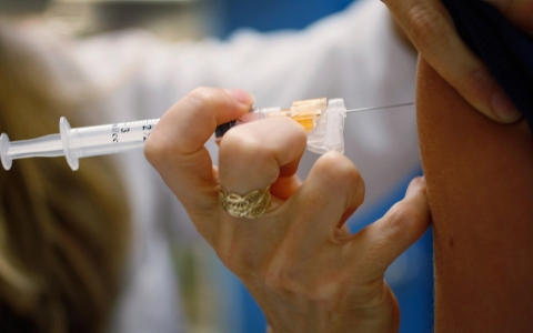 In this file photo, a pediatrician in Miami injects the HPV vaccine into a 13-year-old girl's arm.