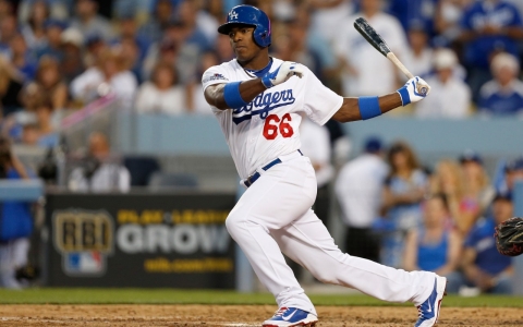 L.A. Dodgers rookie sensation Yasiel Puig was one of 21 Cuban-born players on major league rosters in 2013.