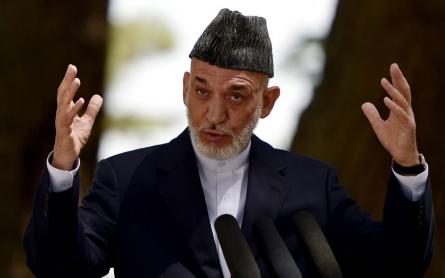 Karzai seeks Pakistan's help with Taliban peace bid