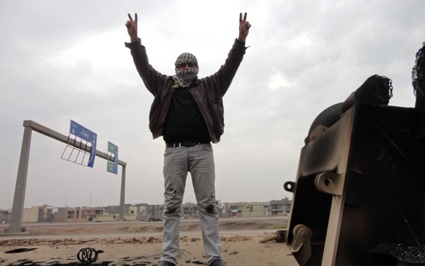 A man shows off the V-sign in Iraq