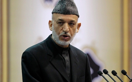 Karzai says US should re-engage Taliban peace talks or leave country