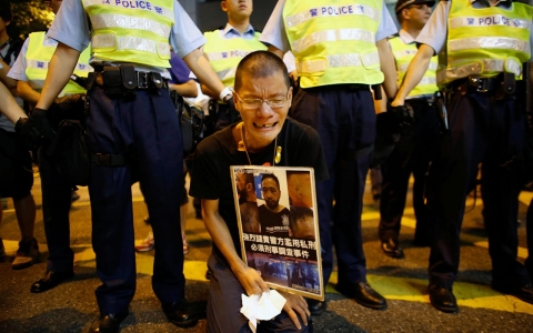 Thumbnail image for Police beating stirs outrage in Hong Kong