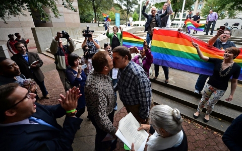 Thumbnail image for Gay couples welcomed at the altar but not at the office