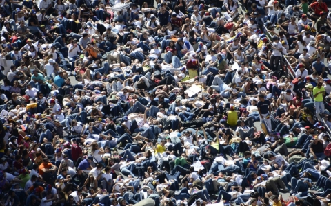 Thumbnail image for Venezuelan government supporters march as opposition protests continue