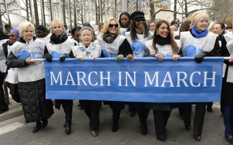 Protesters march from the United Nations Friday in honor of International Women's Day.