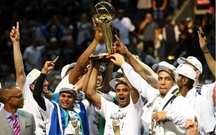 Spurs cool the Heat 104-87 for NBA title