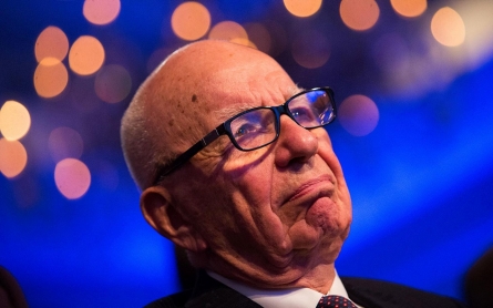 Rupert Murdoch tries to buy Time Warner