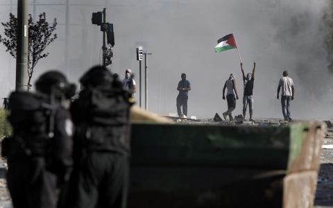 Thumbnail image for Israeli police, Palestinians clash during Palestinian teen’s funeral