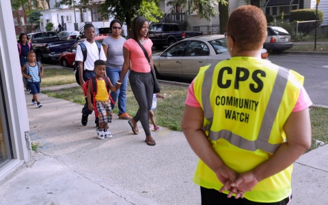 Thumbnail image for Chicago students ushered to school under watch of safety guards