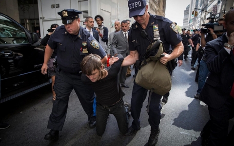 Thumbnail image for Police arrest 104 climate change protesters in Wall Street standoff