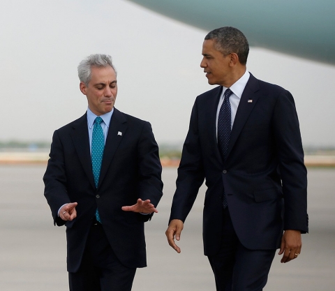 President Barack Obama talks with Chicago Mayor Rahm Emanuel on the tarmac upon his arrival at O'?Hare International Airport in Chicago, Wednesday, May 29, 2013.