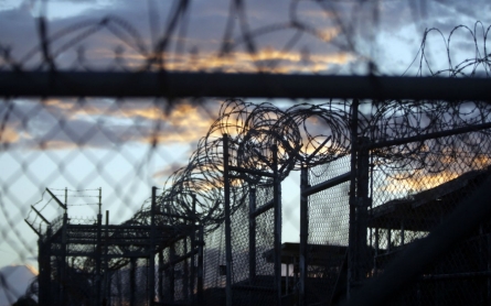 Obama expected to sign defense bill despite clause blocking Gitmo closure