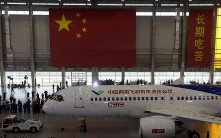 China unveils home-built jetliner 