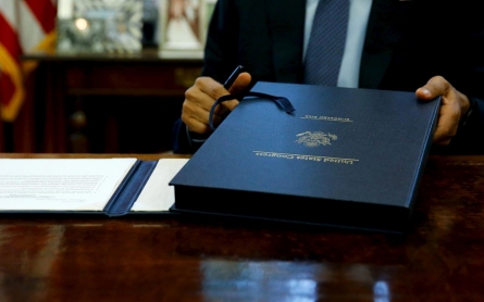 Obama signs budget, debt deal before default deadline