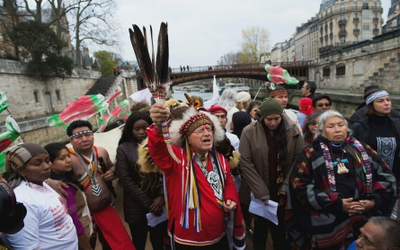 Draft of Paris climate deal omits references to human rights