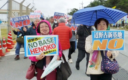 Okinawa sues Tokyo in bid to stop move of US air base