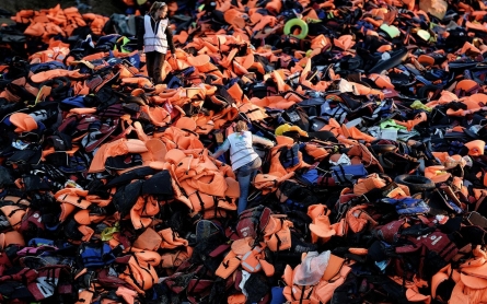 In Greece, volunteers upcycle refugee life jackets, boats