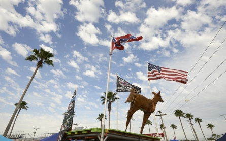 NASCAR tracks put the brakes on Confederate flag