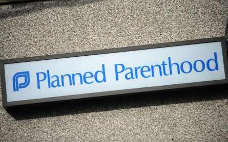 Arkansas governor cuts state contracts with Planned Parenthood