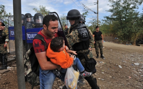 Thumbnail image for Macedonian troops fire stun grenades at refugees on border