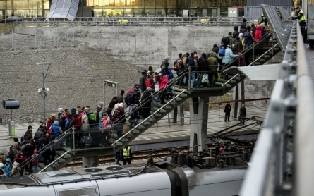 Masked men rampaged through Stockholm threatening refugees 