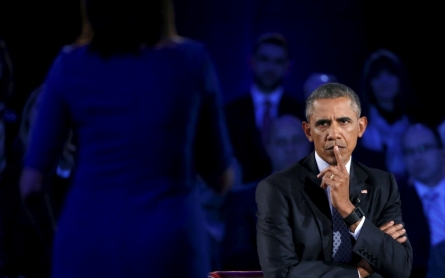 Pushing for gun controls, Obama tears into the NRA 