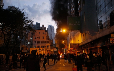 Hong Kong activists, police clash over food stalls