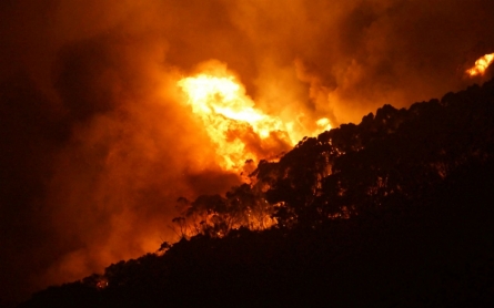 Raging Australian bushfire destroys more than 100 homes