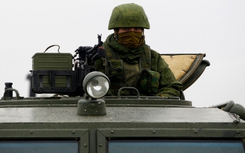 A Russian soldier patrol the Sevastopol military airport