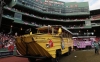 Duck boats assemble at Fenway Park before the World Series victory parade for the Red Sox on Nov. 2, 2013, in Boston.