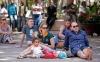 People follow the proceedings of Nelson Mandela's funeral 