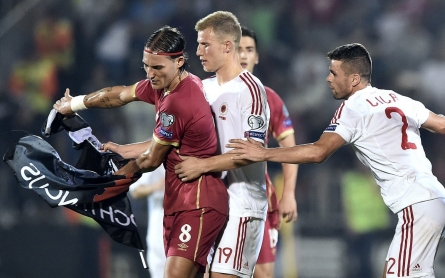 Photos: Albania-Serbia soccer match suspended after brawl over flag