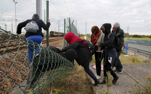 Thumbnail image for Photos: Migrants flood Channel Tunnel entrance