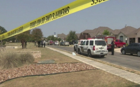 Thumbnail image for Man appears to have hands raised when shot by police